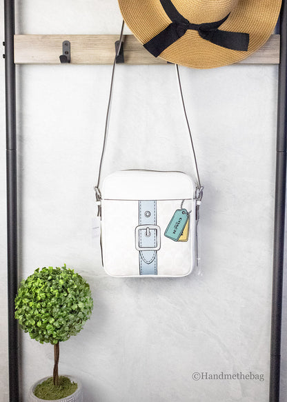 Coach Hudson 21 medium chalk Trompe L'oeil print handbag with structured silhouette and top handles.