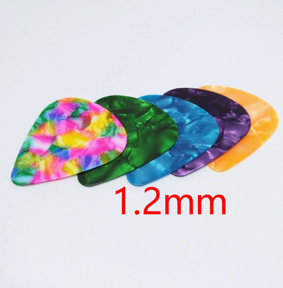 Folk Bakelite ukulele guitar pick with a vintage-inspired design