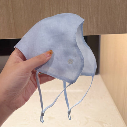 Lightweight linen Tencel breathable sun-protective mask in a soft neutral fabric with ear loops