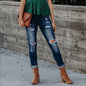 BackupMyFilesNow® ladies' chic denim trousers featuring classic five-pocket style and slim fit design.