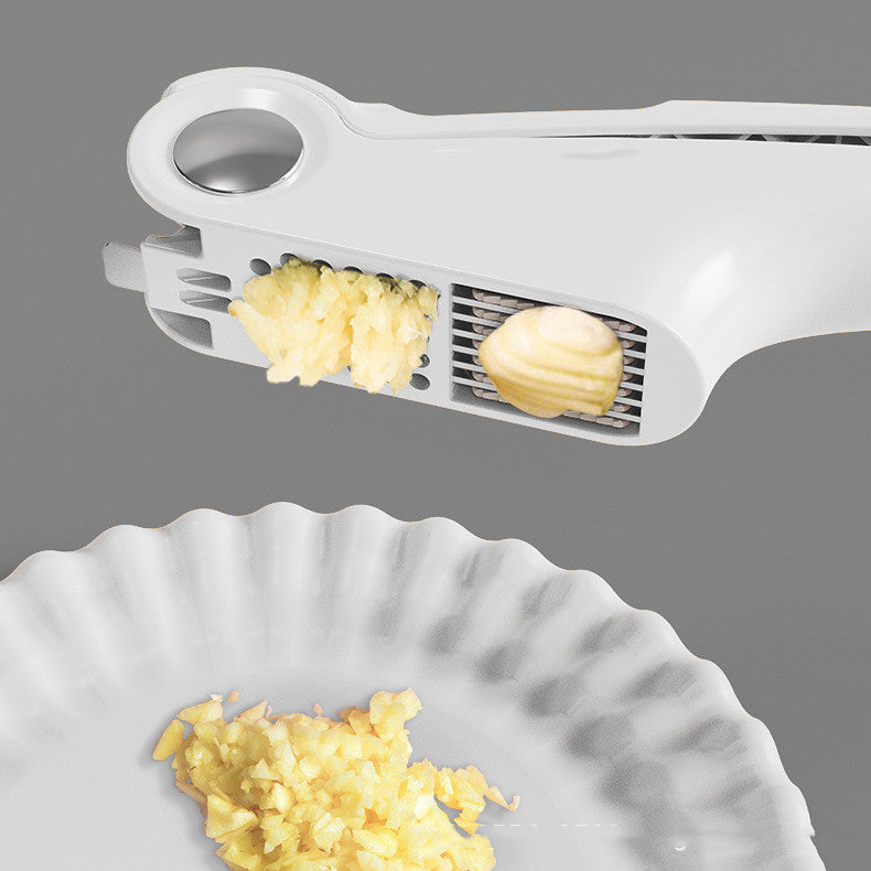 Manual garlic press kitchen gadget for crushing garlic cloves by hand
