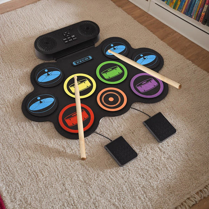 Portable silicone jazz drum set percussion instrument with compact pads and drumsticks