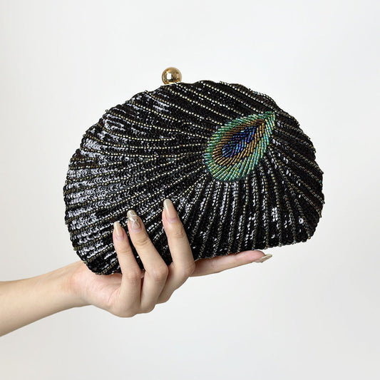Women's vintage beaded one-shoulder crossbody chain handbag with decorative beadwork and metallic chain strap