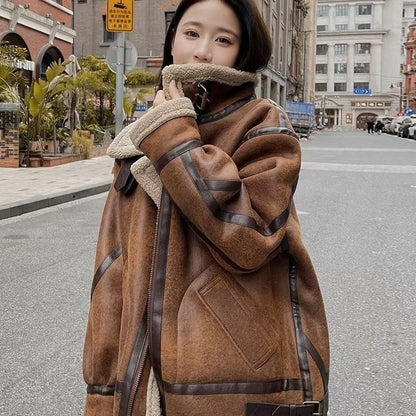 Women's lamb fur coat in a classic design, shown in soft brown fur