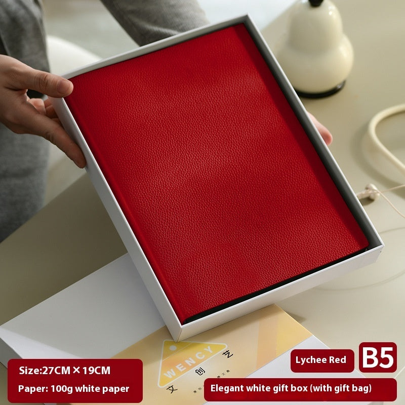 Litchi pattern soft leather covered notebook with textured surface and rounded corners