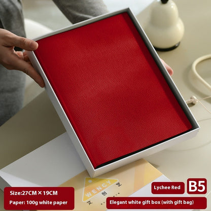 Litchi pattern soft leather covered notebook with textured surface and rounded corners