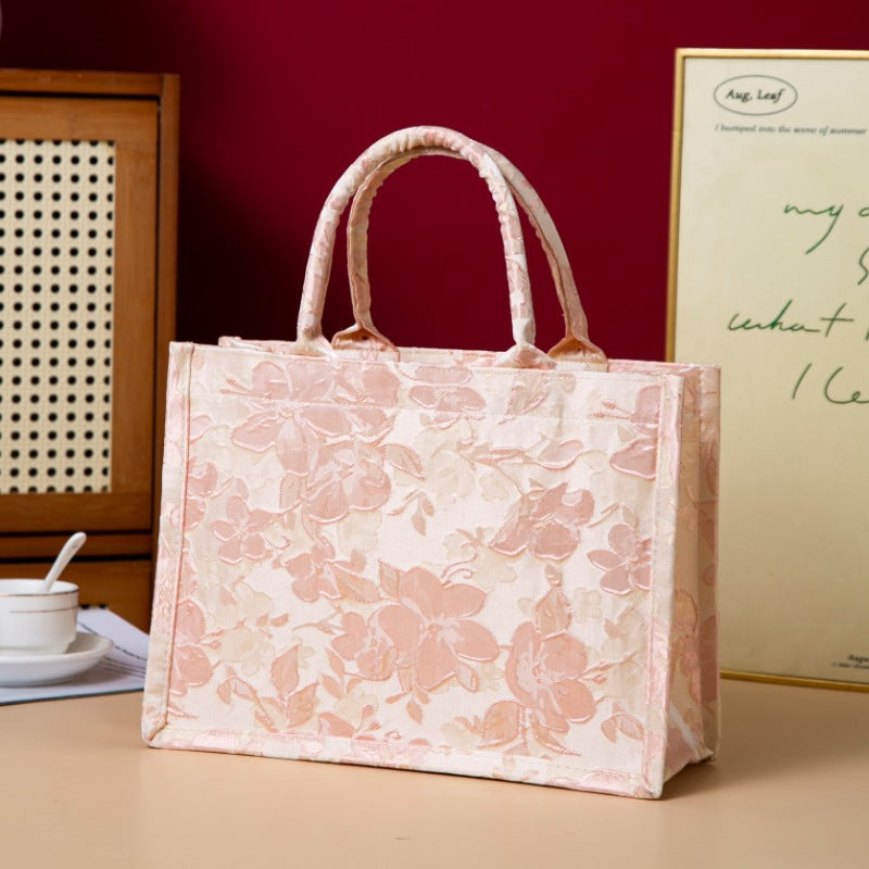 Relief-printed souvenir canvas gift bag by My Store, featuring a textured design and sturdy fabric handles