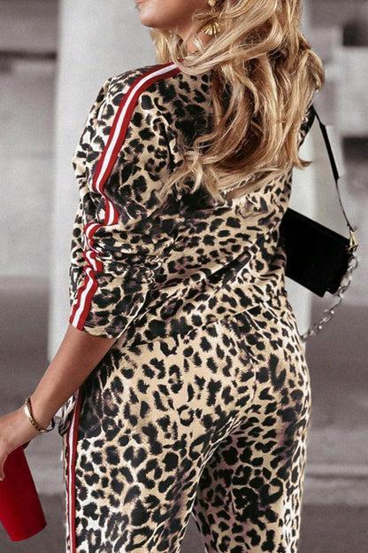 Plus size leopard print round neck top and pants set for women, featuring a stylish, comfortable fit with bold animal print design.
