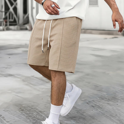 Men's drawstring loose-fit athletic shorts in a relaxed design with an adjustable waistband