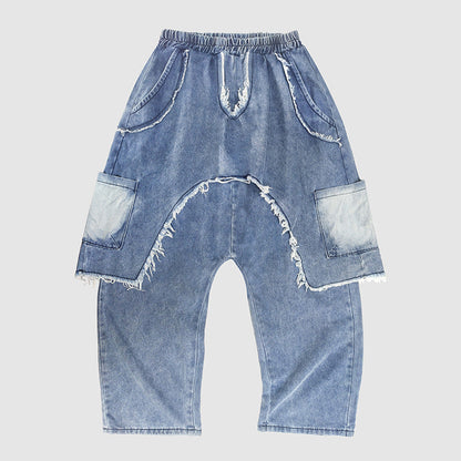 Personalized distressed brushed ripped jeans with a trendy faded finish and visible knee tears