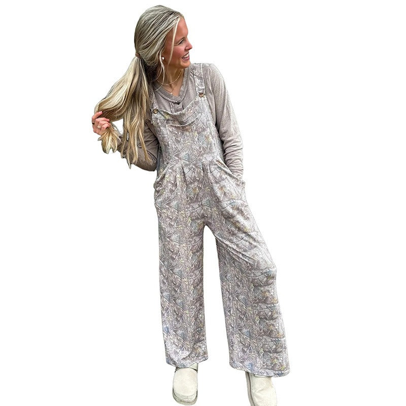 High-waisted camo-print jumpsuit with pockets and fitted silhouette
