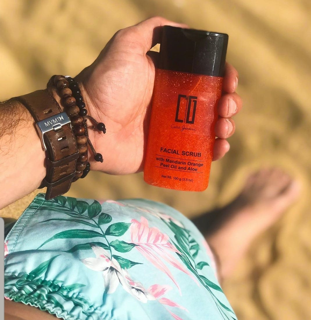 BACKUPMYFILESNOW® Mandarin and Aloe Facial Scrub for Him with textured surface and natural ingredients visible in the container.