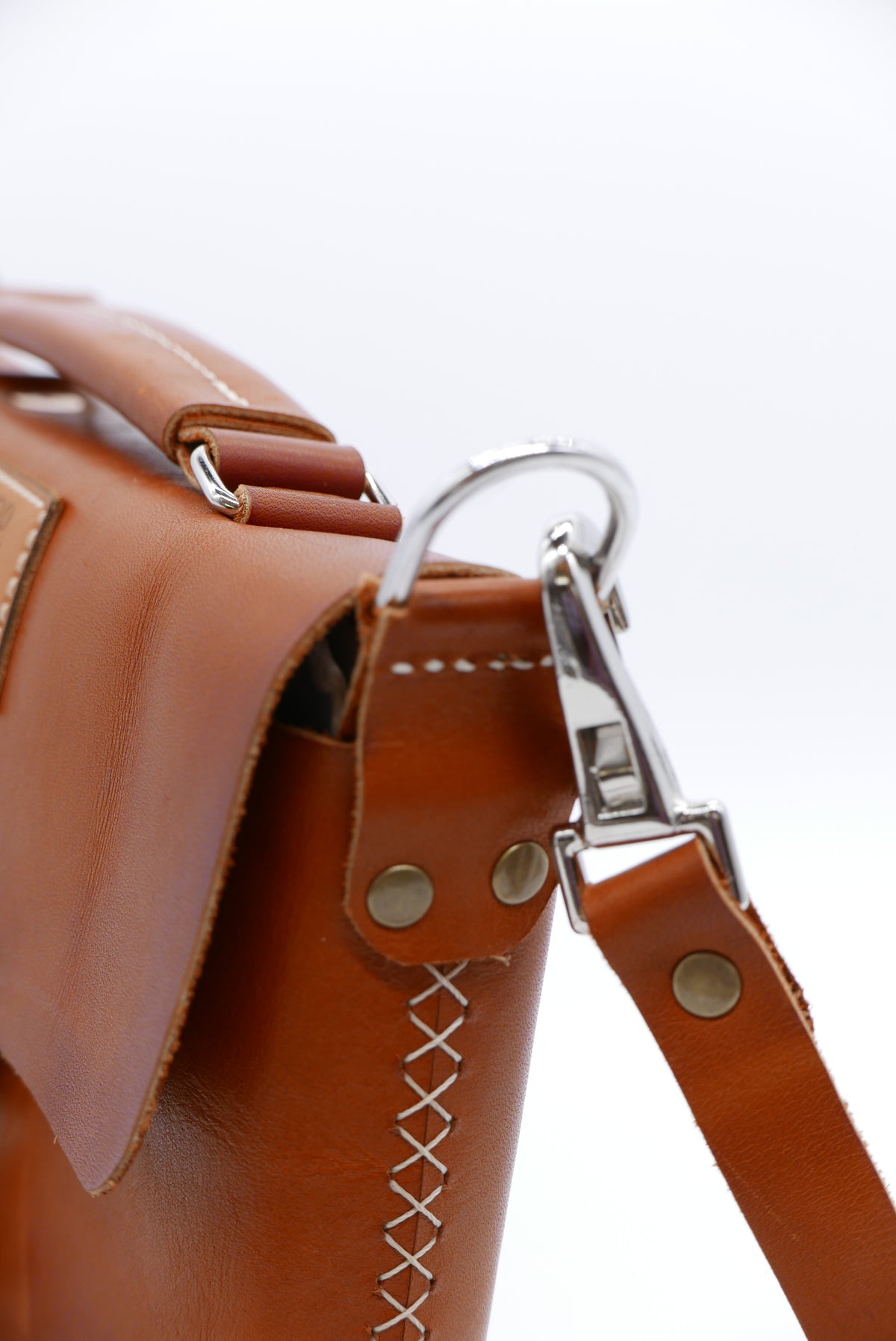 Compact BLCO® Satchel Mini leather travel pouch by Bueno Leather Co., featuring handcrafted design and a sleek, versatile style.