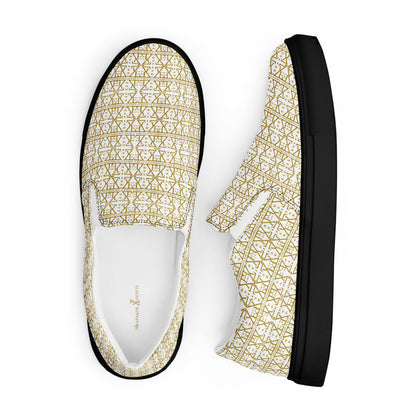 White women's slip-on shoes by Atelier Evezet Arapakou with waterproof canvas and anatomical sole, shown from a side angle.