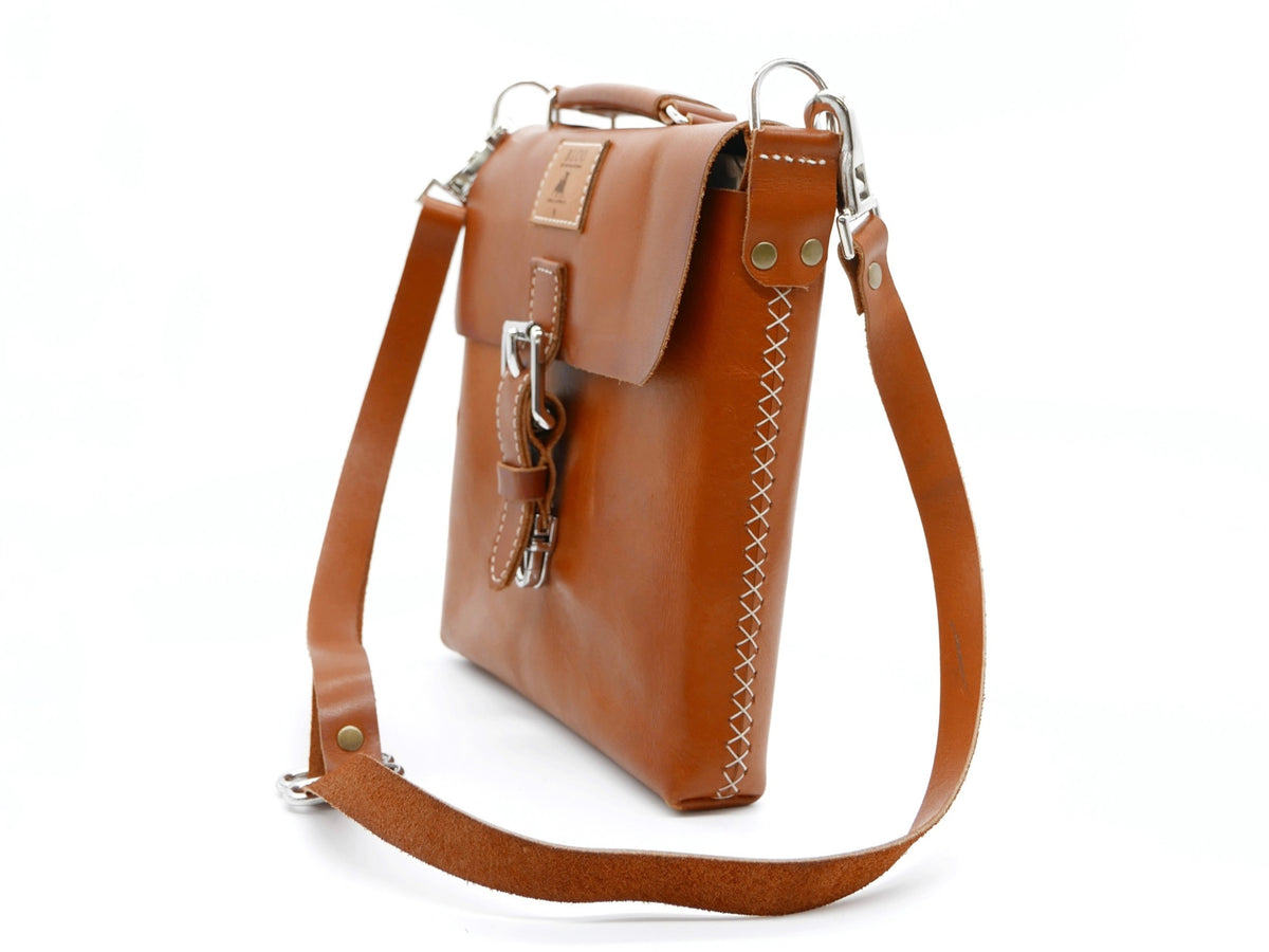 Mini handcrafted leather satchel from BLCO® Travel Pouches by Bueno Leather Co., featuring a compact, stylish leather design.