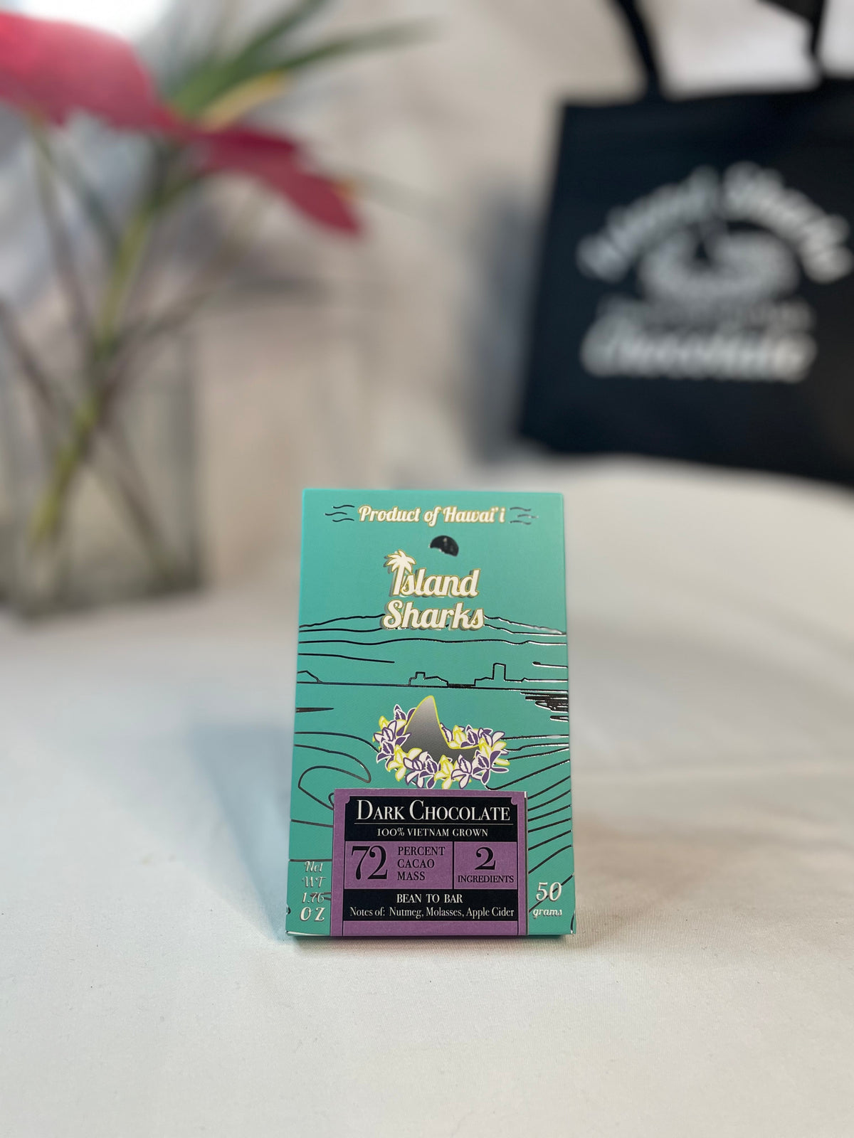 Six ISLAND SHARKS CHOCOLATE Hawai'i Inclusion Bars in assorted flavors, displayed together in a pack.