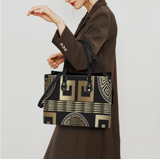 Women's handbag with original Greek design, Atelier Evezet Arapakou, featuring intricate patterns and a stylish purse shape.
