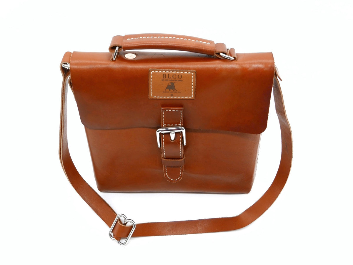 Bueno Leather Co. BLCO® Satchel Mini, a compact handcrafted leather travel pouch with a sleek design.