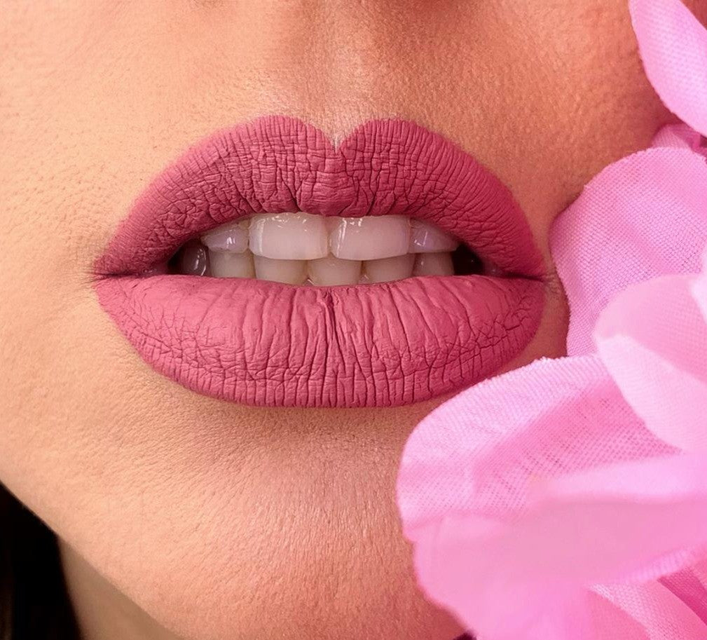 Matte liquid lipstick in shade 9 from BACKUPMYFILESNOW® showcasing its smooth, matte finish and applicator brush.