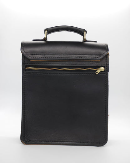 Handcrafted leather BLCO® travel satchel case with adjustable strap and brass hardware, designed for stylish travel and organization.