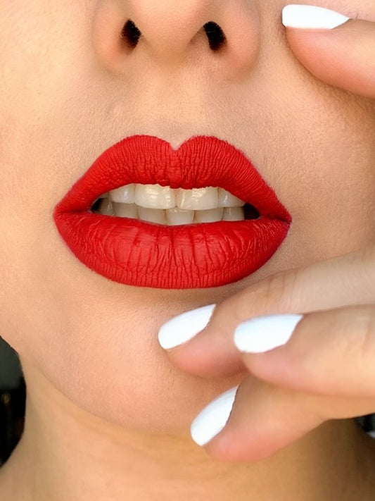 Matte liquid lipstick in shade 17 by BACKUPMYFILESNOW®, showcasing the smooth, velvety finish on lips.