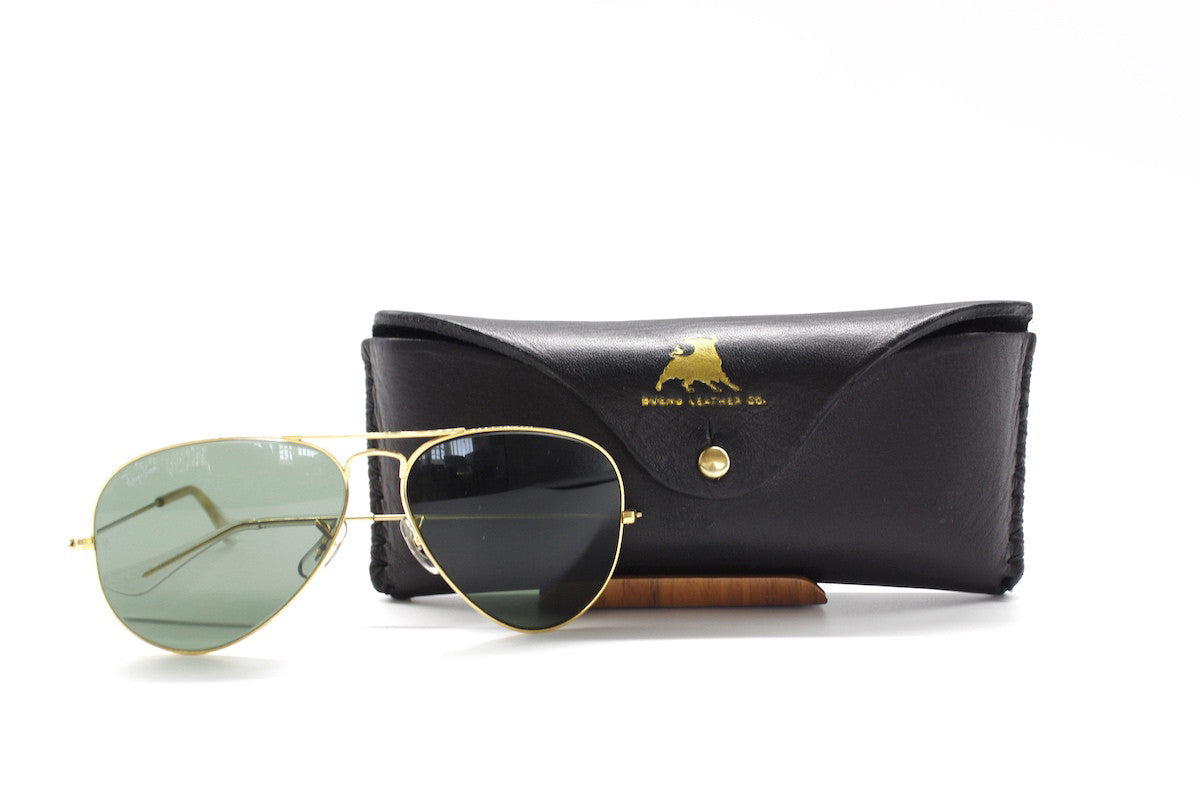 Bueno Leather Co. BLCO® handmade sunglasses case in brown leather with stitched detailing and secure snap closure.