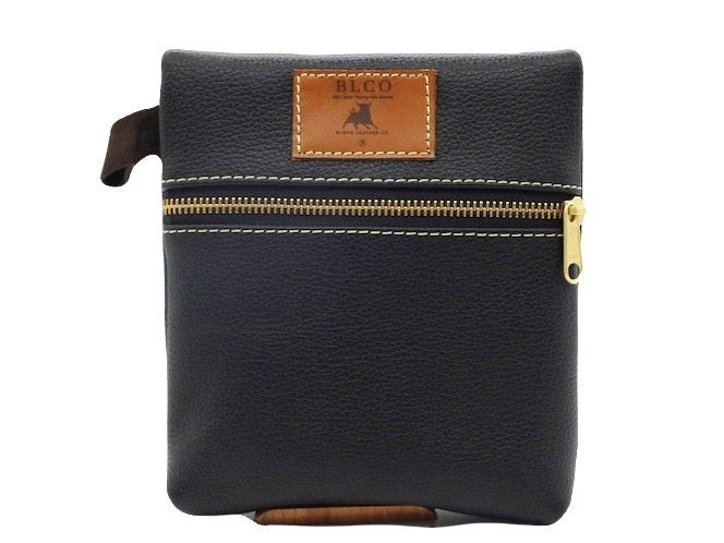 Durable handcrafted leather travel pouch by Bueno Leather Co. with a zip closure and compact design for organization.