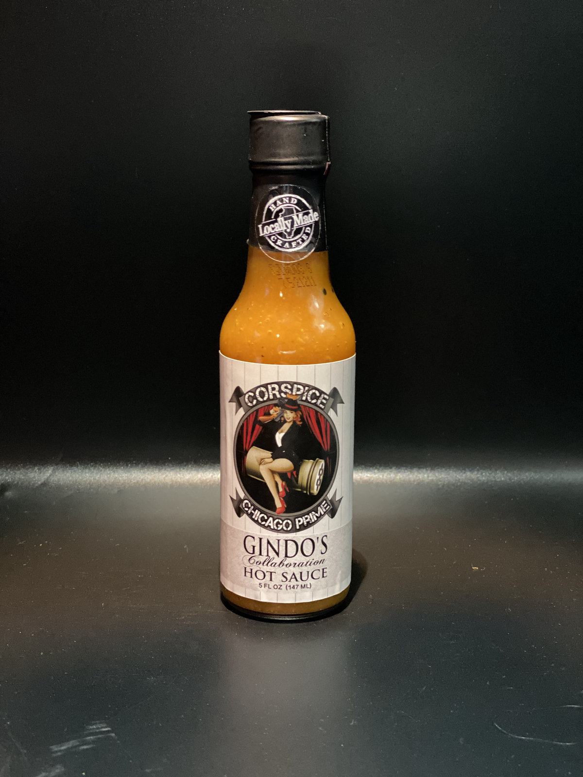 Corspice K9 for Vets Chicago Prime Hot Sauce bottle, featuring red chili peppers and vibrant label design.