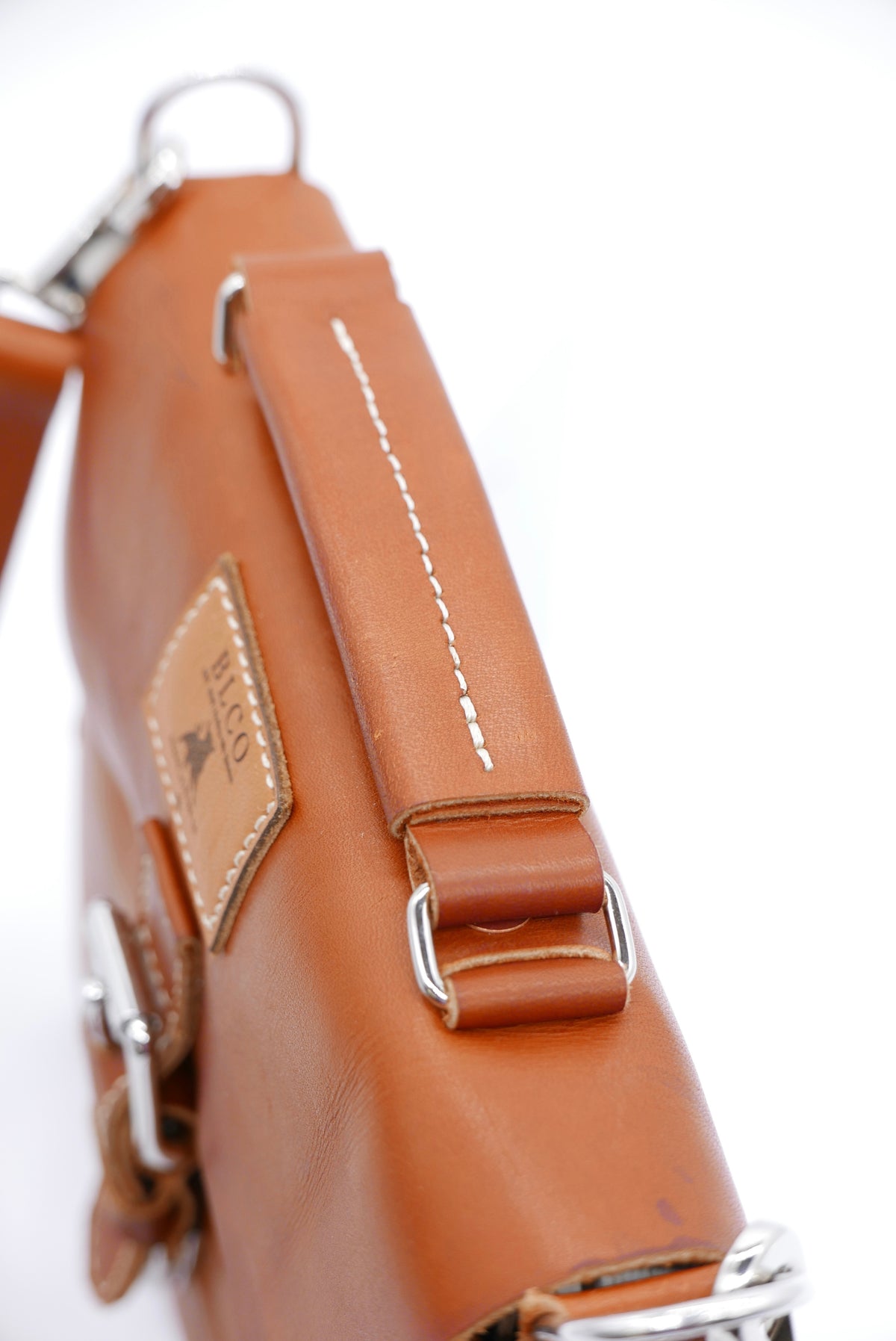 Mini BLCO® leather satchel by Bueno Leather Co. featuring compact handcrafted design with a top handle and leather strap.