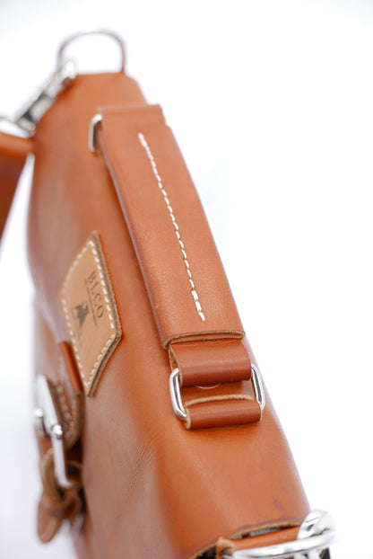 Mini BLCO® leather satchel by Bueno Leather Co. featuring compact handcrafted design with a top handle and leather strap.
