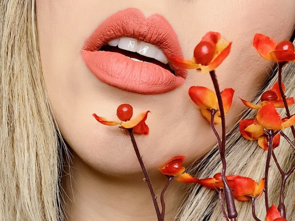 Matte liquid lipstick in shade 14 by BACKUPMYFILESNOW®, shown in a sleek tube with the applicator ready for use.