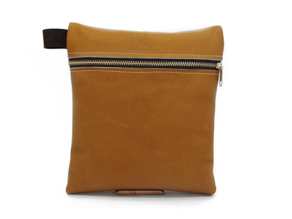 BLCO® Durable handcrafted leather travel pouch by Bueno Leather Co. with secure zipper closure and rustic brown finish.