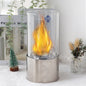 JHY DESIGN portable tabletop firepit with cylindrical shape, glass sides, designed for gel and ethanol fireplaces.