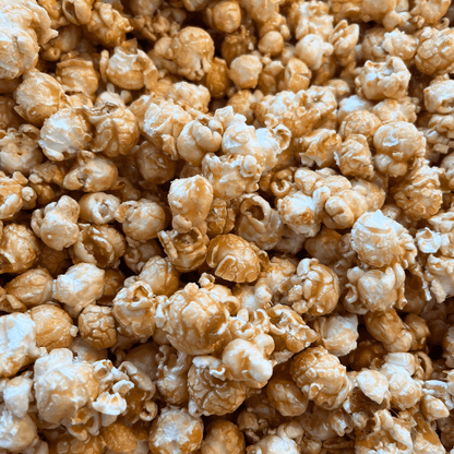 Fisher's Popcorn caramel popcorn tub, 1.2-gallon size, in a colorful container with a clear view of popcorn inside.