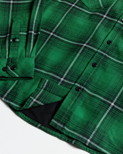 Green Destroyer Flannel by Off The Grid Surplus, a soft and stylish men's flannel shirt with a plaid pattern.