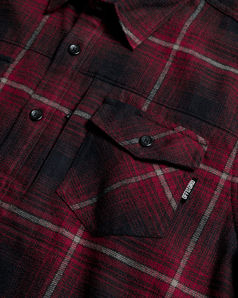 Black Destroyer Flannel by Off The Grid Surplus, showing a close-up of the soft, plaid fabric with a button-up design.
