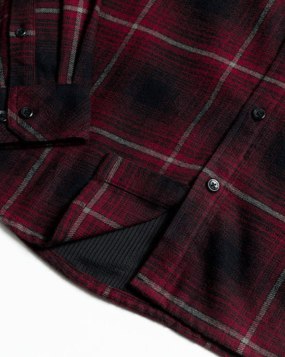 Black Destroyer Flannel by Off The Grid Surplus, showcasing a cozy, soft flannel shirt with a classic plaid pattern.
