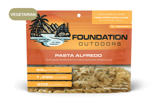 Foundation Outdoors Pasta Alfredo Meal in a ready-to-eat container, showing creamy Alfredo sauce and pasta ready to serve.