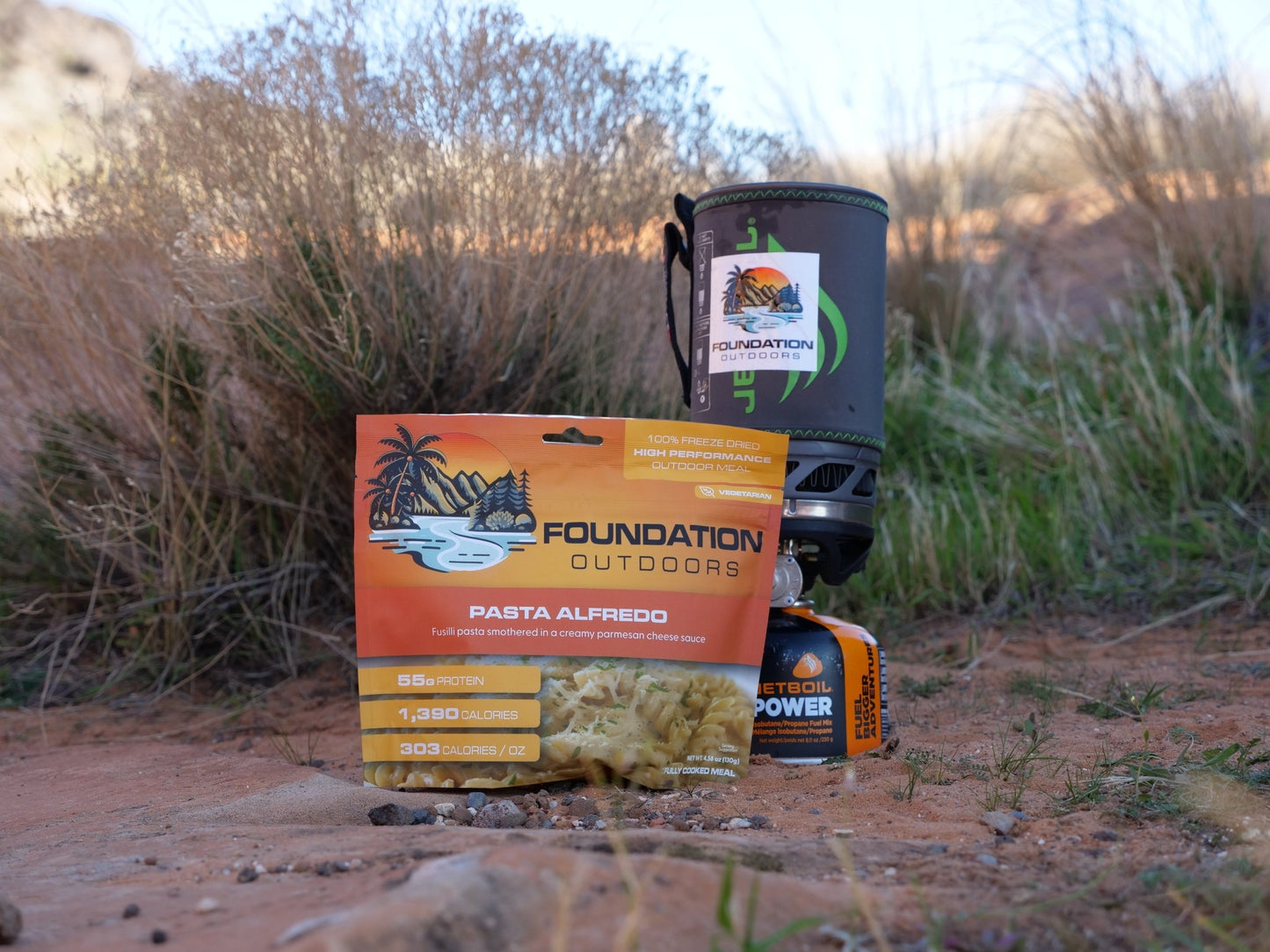 Foundation Outdoors Pasta Alfredo Meal in a ready-to-eat container, showcasing creamy pasta with Alfredo sauce.