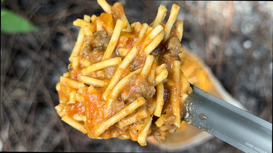 Foundation Outdoors spaghetti with meat sauce meal in a single pouch, ready-to-eat camping or outdoor meal.