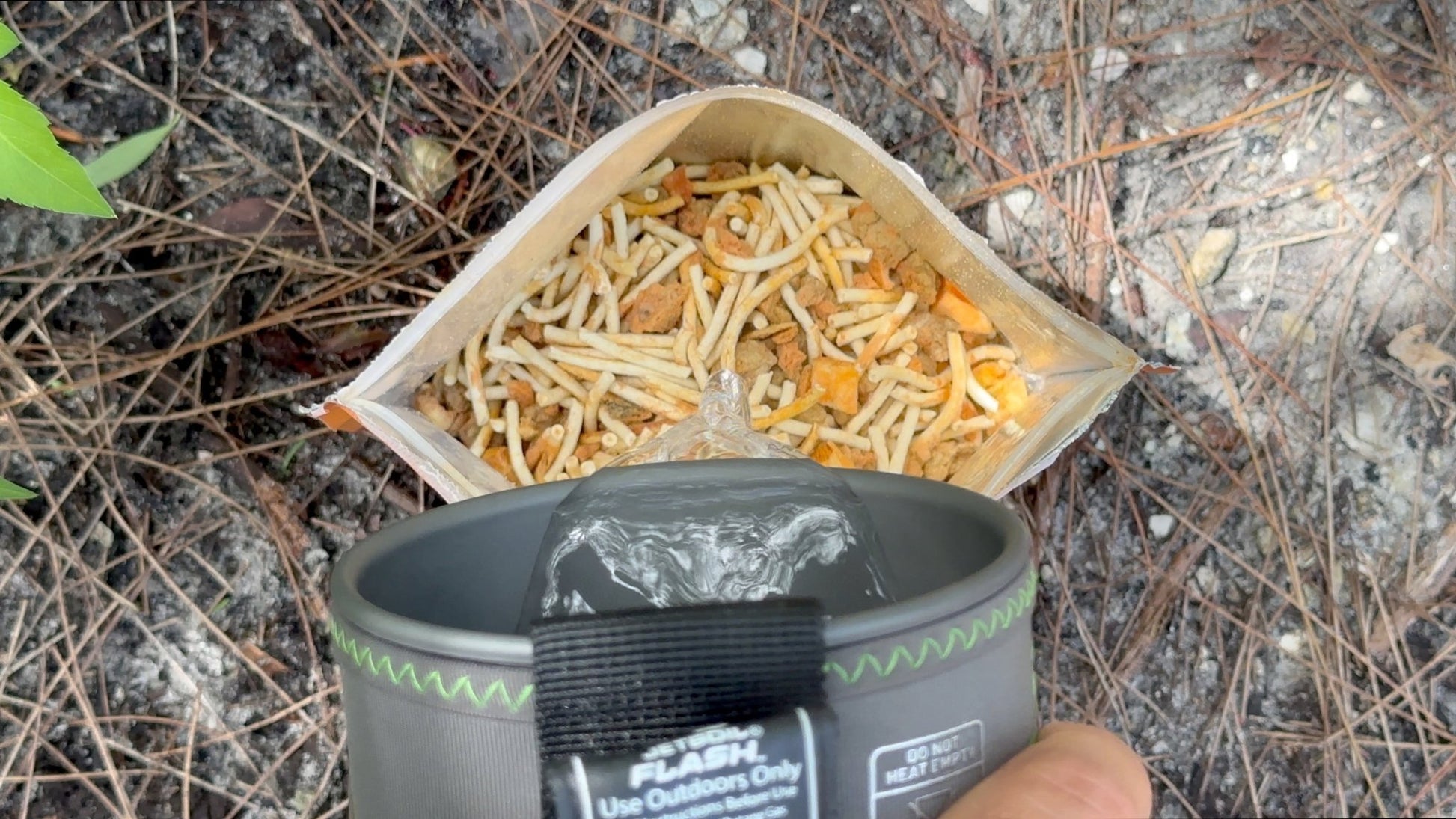 Foundation Outdoors spaghetti with meat sauce meal in a single pouch, ready-to-eat outdoor camping food.