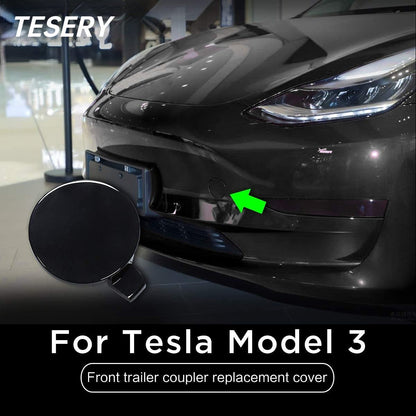 Tesla Model 3 front bumper tow hole tow hitch cover, OEM exterior trim part with clean finish and precise fit.