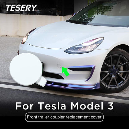 Tesla Model 3 front bumper tow hole tow hitch cover, OEM exterior trim part in black, designed for 2017-2024 models.