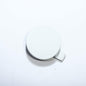 Tesla Model Y front bumper tow hook cover OEM, exterior trim, for 2020-2024 Tesla Model Y vehicles.