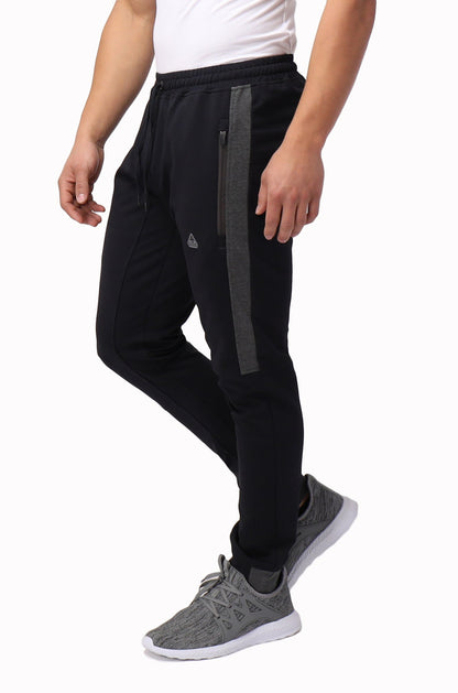 Close-up of SCR Sportswear Infinite Flex Tall Fit men's jogger sweatpants showing the front waistband and fabric texture.