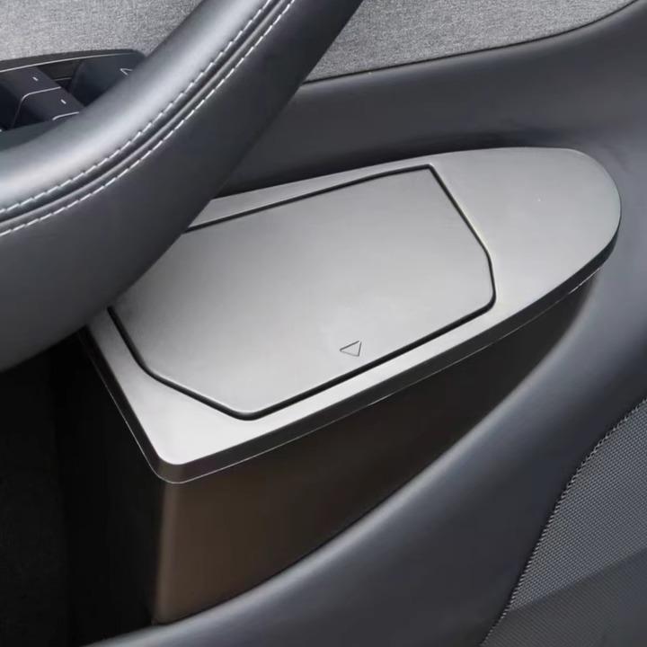 Two Tesery Tesla Model Y Juniper front door trash can organizers, compact storage boxes for clean and organized vehicle interior.