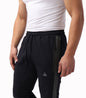 Close-up of SCR Sportswear Infinite Flex Tall Fit men's joggers sweatpants showing front details and fabric texture.