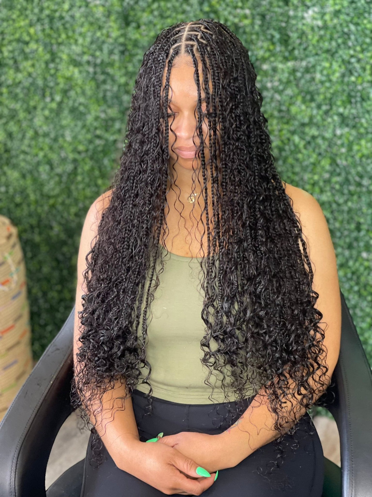 Fula Beauty Deep Wave Boho Hair in natural black, 12-inch length, showcasing soft, wavy texture and full volume.