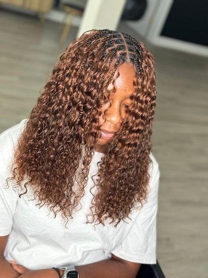 Deep Wave Boho Hair by Fula Beauty in natural black, 12-inch length, showcasing soft, wavy texture with a natural shine.