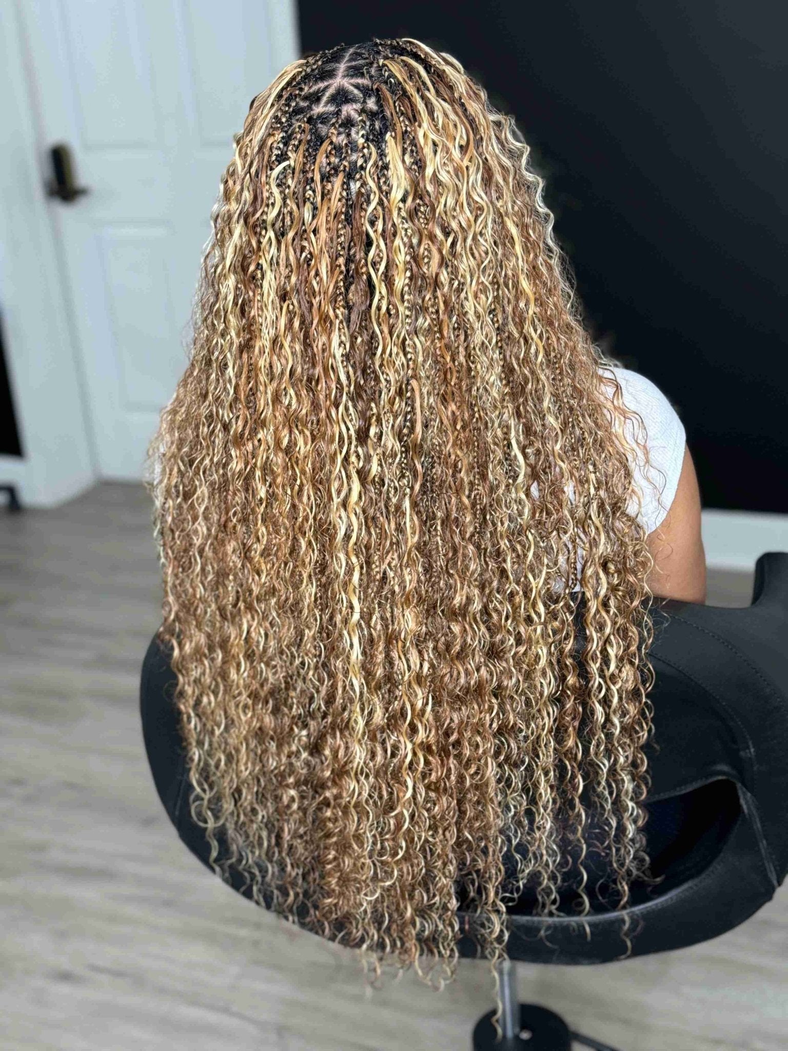 Fula Beauty deep wave boho hair in natural black, 12-inch length, showing soft, flowing deep wave texture.